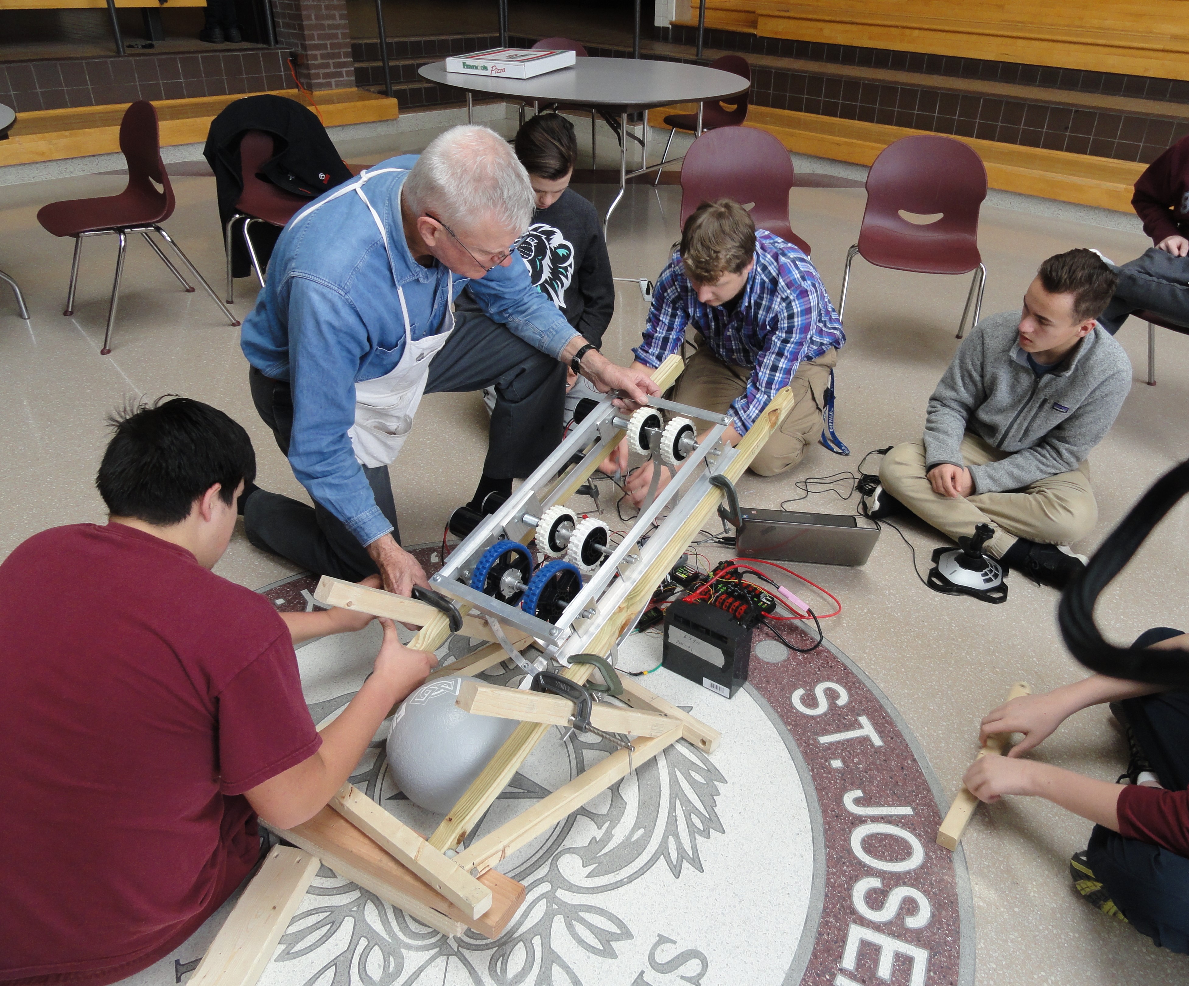 Students working with a mentor